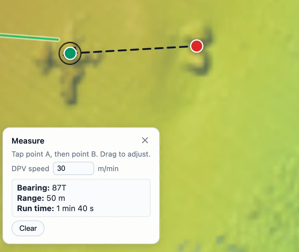 Two wrecks standing out of a depth-shaded survey raster, joined by a measurement line, with the Measure panel reading bearing, range and run time